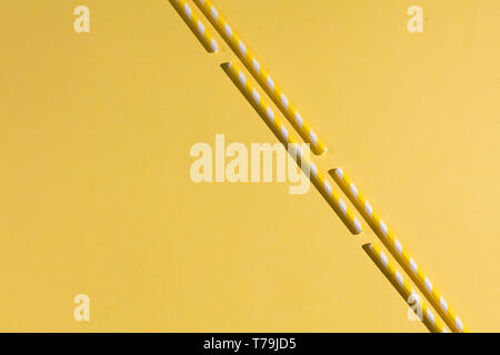 diagonal lines. copy space.sticks on the yellow background, the Montessory method of education Stock Photo