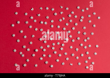 tiny maccaroni isolated on the red background. flat view. food, dish, meal concepts Stock Photo