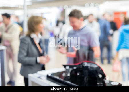 Blured image of businesspeople socializing and networking at business and entrepreneurship meeting. Stock Photo