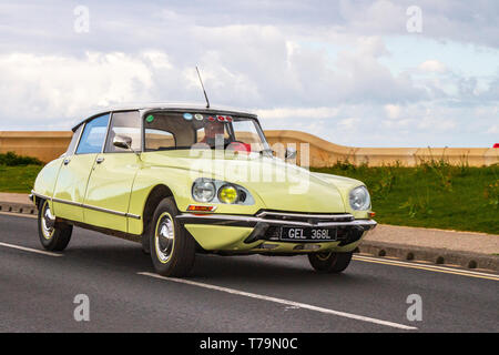 1972 70s yellow French Citroën DS at Cleveleys Spring Car Show at Jubilee Gardens in 2019. A new location for foreign Classic cars, veteran, retro collectable, restored, cherished old timers, heritage event, vintage, automobiles Stock Photo