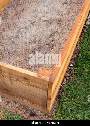 Raised bed lined with chicken wire to keep gophers, voles and moles out.