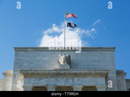 Detail of the eagle and flags of the Federal Reserve building HQ in Washington DC Stock Photo