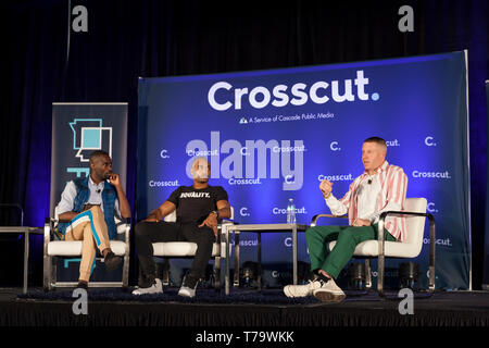 Seattle, Washington: Macklemore, given name Ben Haggerty, speaks during a panel at the Crosscut Festival. Activist and author DeRay McKesson lead a co Stock Photo