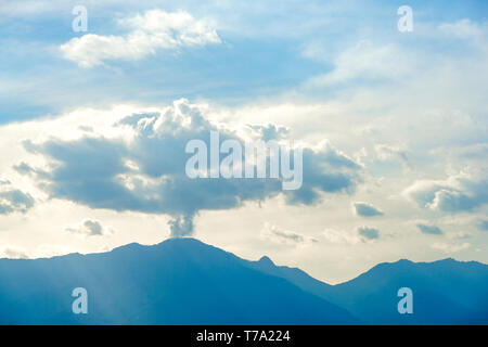 Mountain and Lake with the unique cloud in the Phayao lake, province of the North of Thailand. Stock Photo