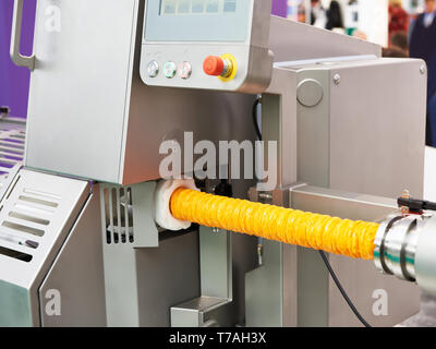 Automatic double clippers for sausages filling machines Stock Photo