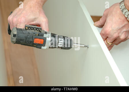 The process of furniture assembly screws closeup Stock Photo