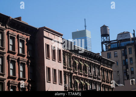 Older Browstones on Madison Avenue, Upper East Side with the Bloomberg Building in the Background, NYC, USA Stock Photo