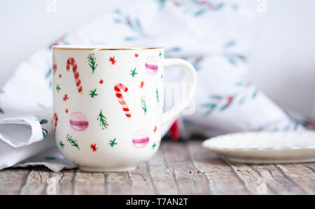 closeup of ceramic cup on wood table Stock Photo