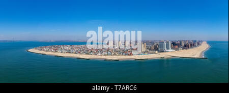 Panoramic view of southern Brooklyn including Coney  Island, Brighton Beach with Manhattan in the background. Stock Photo