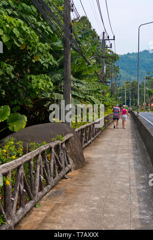 Footpath near national park, Phet Kasem Road, main road, Khao Lak, Thailand Stock Photo