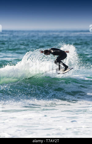 Spectacular surfing action at popular surfing hotspot Fistral beach in Newquay in Cornwall. Stock Photo