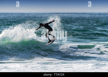 Spectacular surfing action at popular surfing hotspot Fistral beach in Newquay in Cornwall. Stock Photo