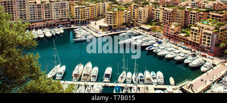 View of Fontvieille southernmost ward in the Principality of Monaco, view from above panoramic image, moored yachts Mediterranean bay Stock Photo