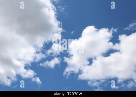 Spring Clouds Against a Blue Sky Stock Photo