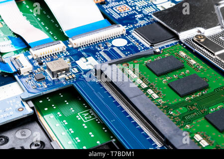 Macro shot of Circuit board with resistors microchips and electronic components. Computer hardware technology. Integrated communication processor. Inf Stock Photo