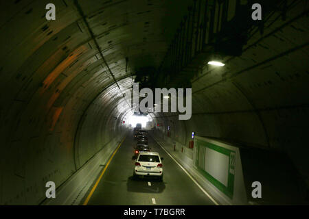 Ismailia, Egypt. 5th May, 2019. Vehicles drive through a newly opened tunnel, which runs under the Suez Canal, in Ismailia, Egypt, on May 5, 2019. Egyptian President Abdel-Fattah al-Sisi said on Sunday that all companies working on the country's national development projects are run by civilians, stressing that the military's role is only supervisory. Credit: Ahmed Gomaa/Xinhua/Alamy Live News Stock Photo