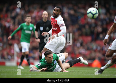 London, UK. 05th May, 2019. Alexandre Lacazette (A) Lewis Dunk (B&HA) at the Arsenal v Brighton and Hove Albion English Premier League football match at The Emirates Stadium, London, UK on May 5, 2019. **Editorial use only, license required for commercial use. No use in betting, games or a single club/league/player publications** Credit: Paul Marriott/Alamy Live News