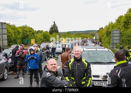 Tonbridge UK. 6th May 2019. Motorists and motorcyclists stand on