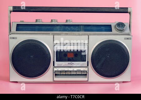 Vintage stereo on pink pastel color background Stock Photo