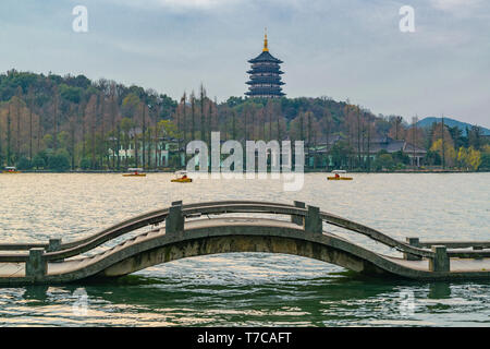 HANGZHOU, CHINA, DECEMBER - 2018 - Winter day scene at touristic west lake with leifeng pagoda at background, hangzhou city, china Stock Photo