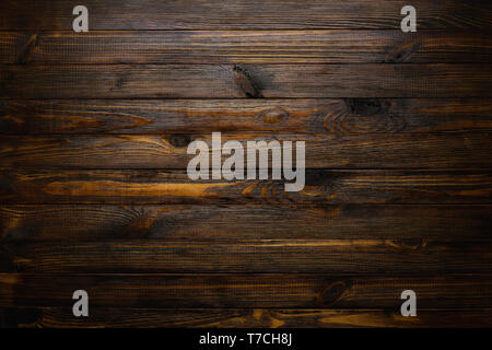 Natural rustic wood background. Wood texture. Table of blank dark rustic planks top flat lay view. Stock Photo