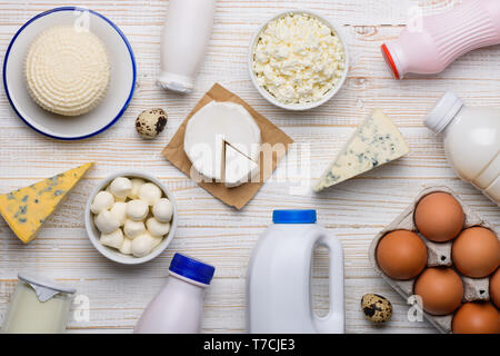 Different dairy products on white wooden table flat lay top view Stock Photo