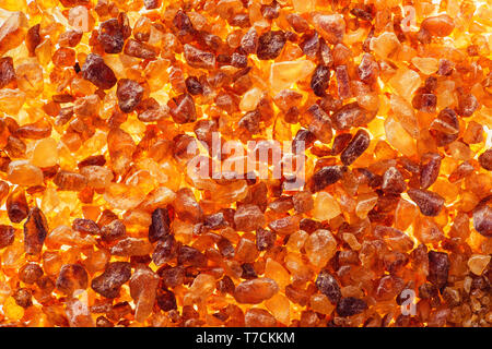 Brown sugar crystals macro background Stock Photo