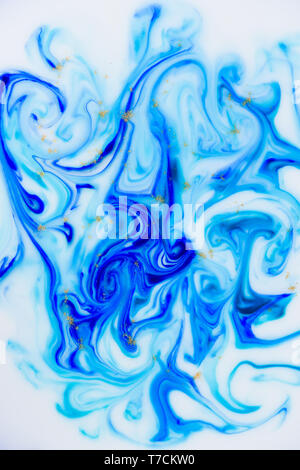 Marbled unique blue white and gold abstract background. Flowing liquid marble texture Stock Photo