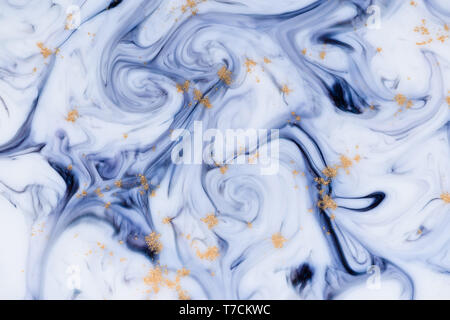 Marbled unique blue abstract background with gold dust Stock Photo