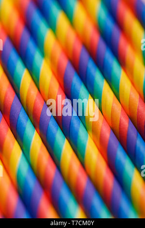 Striped multicolored straws macro background Stock Photo