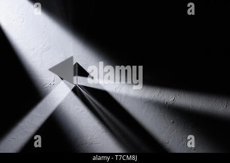 Prism refracting light top view Stock Photo
