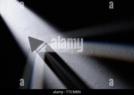 Optical prism refracting light top view Stock Photo