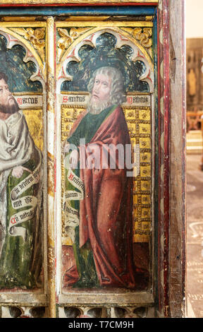 Medieval paintings of saints on rood screen inside church of Saint Andrew, Bramfield, Suffolk, England, UK -  Saint Matthew Stock Photo