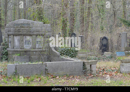 BERLIN - 3 APRIL 2019: Overgrown graves in Weissensee jewish cemetery, ignored during GDR times and despite protected status still poorly maintained. Stock Photo