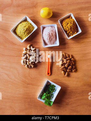 ingredients for a vegan preparation presented on a wooden surface Stock Photo