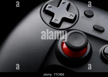 Joy stick game pad closeup on black background Stock Photo