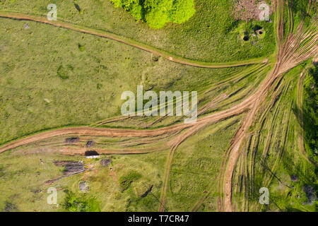 Aerial view of a countryside rural dirt road by drone Stock Photo