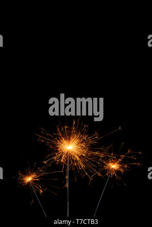 Party sparklers isolated on black background Stock Photo