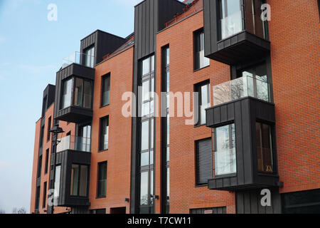 Fragment Facade of a multi-storey modern building. ?oncept of buying affordable housing. Stock Photo