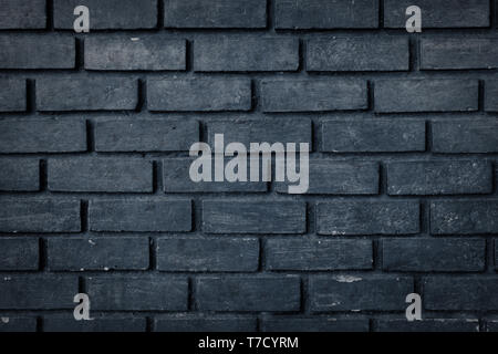 Old black brick wall texture background Stock Photo
