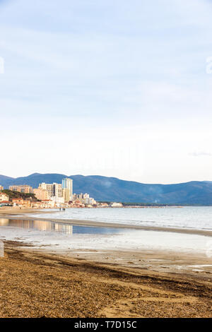 Follonica (GR), Tuscany, Italy. The town seen from the shore in a clear winter day Stock Photo