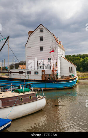 view of the tide mill on the river deben estuary at woodbridge in suffolk uk on a coudy day in spring Stock Photo