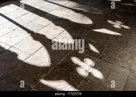 Shadows on stone floor Stock Photo