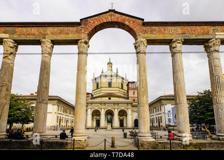 Front view of The Basilica of San Lorenzo Maggiore and 'Colonne di San Lorenzo'  in Milan, Lombardy, Italy. Stock Photo