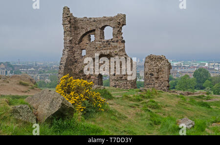 Saint Anthony's Chapel Ruins at Holyrood Park with view across Edinburgh, Scotland behind. Stock Photo