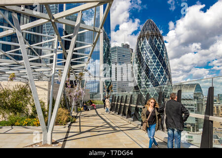 The Gherkin from The Garden at 120 , a roof garden in the City of London on the roof of Fen Court office building, London, UK Stock Photo