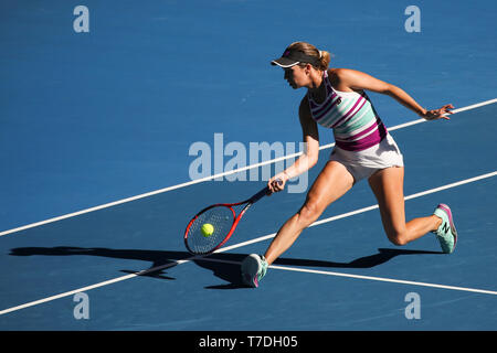 American tennis player Danielle Collins playing forehand in Australian Open 2019 tennis tournament, Melbourne Park, Melbourne, Victoria, Australia Stock Photo
