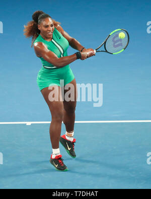 American tennis player Serena Williams playing backhand shot in Australian Open 2019 tennis tournament, Melbourne Park, Melbourne, Victoria, Australia Stock Photo
