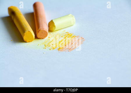 Colorful chalk pastels on a white background, arts, education, creative, back to school, free space for text Stock Photo