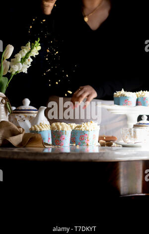 Carrot Cupcakes with Maple Cream Cheese Frosting. Stock Photo